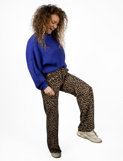 Cheetah print pantalon van travelstof met hoge taille en steekzakken